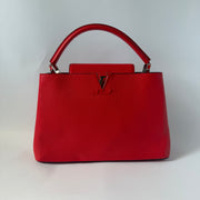 LOUIS VUITTON Taurillon Capucines MM Coquelicot